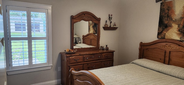3100 Oriole Dr, Gulf Breeze, FL 32563 - bedroom with multiple windows and baseboards