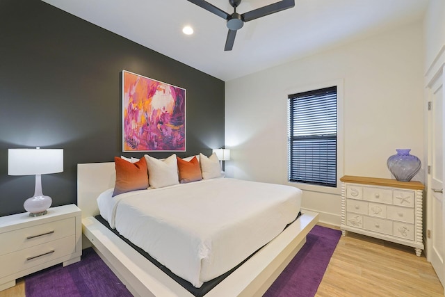 336 S Holiday Rd, Destin, FL 32550 - bedroom with wood finished floors, baseboards, ceiling fan, and recessed lighting