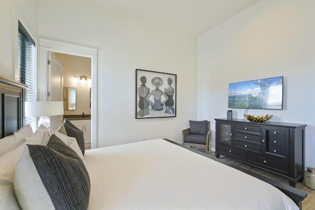 336 S Holiday Rd, Destin, FL 32550 - bedroom featuring wood finished floors and connected bathroom