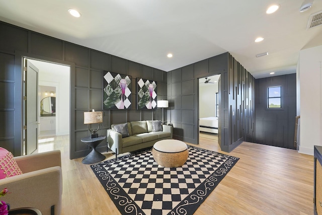 336 S Holiday Rd, Destin, FL 32550 - living area with a decorative wall, light wood finished floors, and recessed lighting