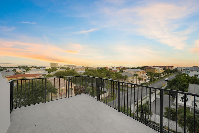 336 S Holiday Rd, Destin, FL 32550 - balcony at dusk with a residential view