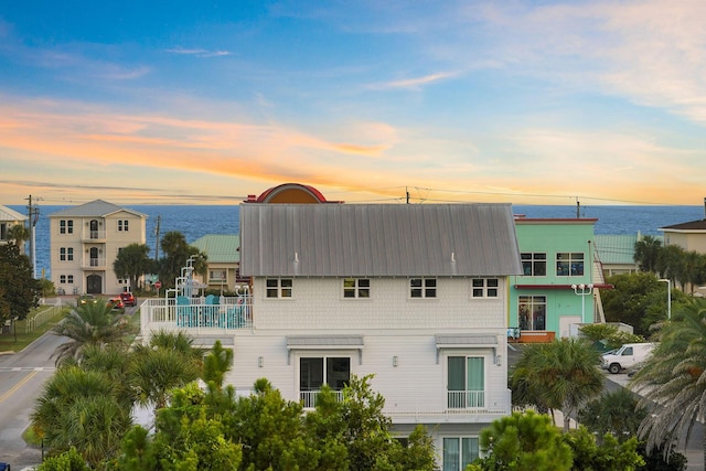336 S Holiday Rd, Destin, FL 32550 - property at dusk featuring a water view
