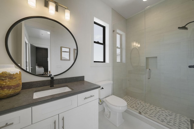 336 S Holiday Rd, Destin, FL 32550 - bathroom featuring a shower stall, toilet, tile patterned floors, vanity, and ensuite bath