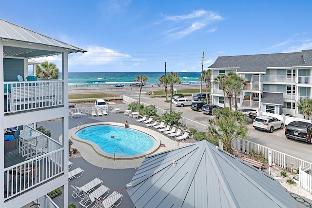 2384 Scenic Gulf Dr Unit C308, Miramar Beach, FL 32550 - community pool featuring a water view