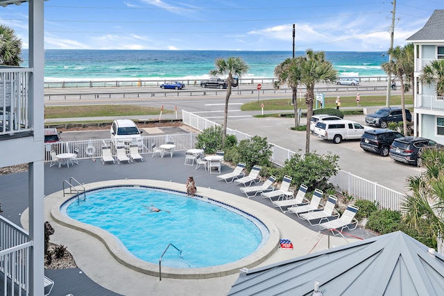 2384 Scenic Gulf Dr Unit C308, Miramar Beach, FL 32550 - community pool with view of water and beach and fence