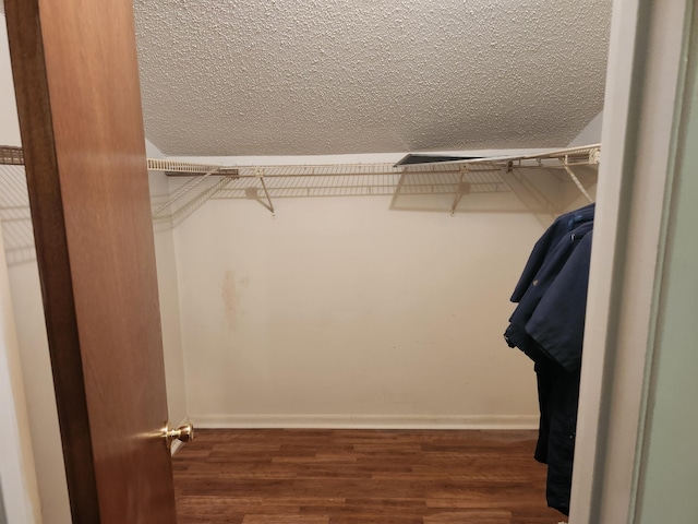 696 Tyner St Unit 7, Fort Walton Beach, FL 32547 - walk in closet featuring wood finished floors