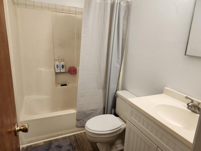 696 Tyner St Unit 7, Fort Walton Beach, FL 32547 - full bath featuring vanity, wood finished floors, and shower / bath combo with shower curtain