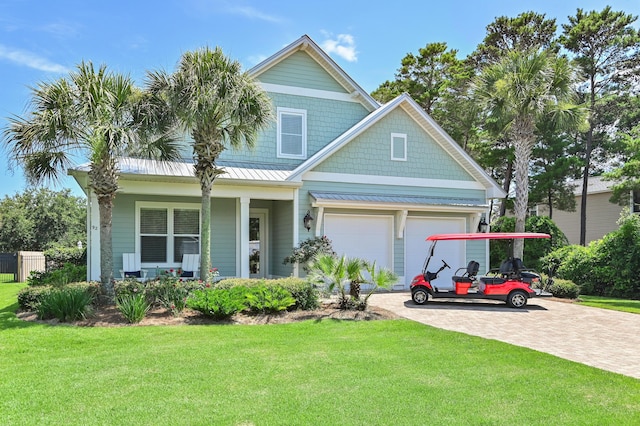 92 Maple St, Santa Rosa Beach, FL 32459 - view of front of home with a front lawn, a porch, and driveway