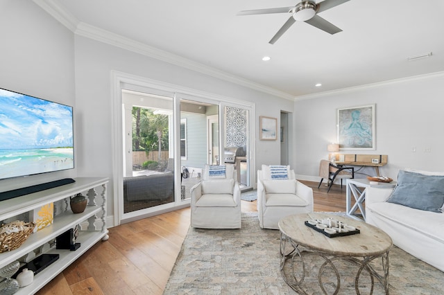 92 Maple St, Santa Rosa Beach, FL 32459 - living room with ornamental molding, wood finished floors, recessed lighting, and a ceiling fan