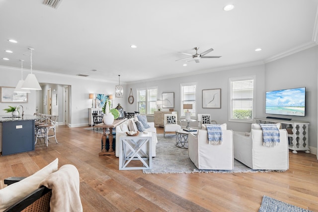 92 Maple St, Santa Rosa Beach, FL 32459 - living area featuring ornamental molding, recessed lighting, light wood finished floors, and ceiling fan