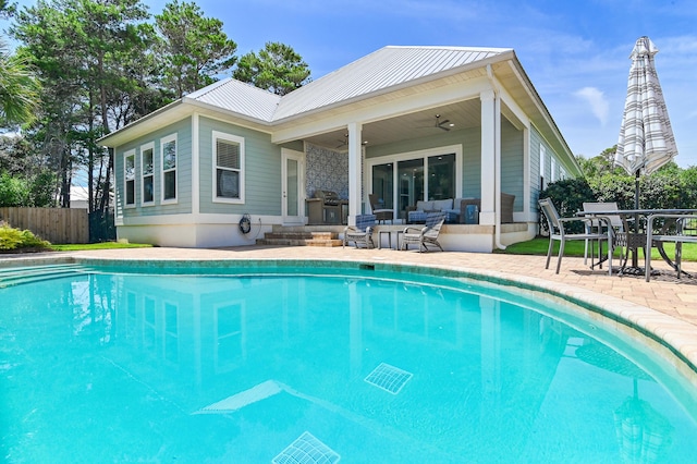 92 Maple St, Santa Rosa Beach, FL 32459 - view of swimming pool with a ceiling fan, a patio, and outdoor dining space