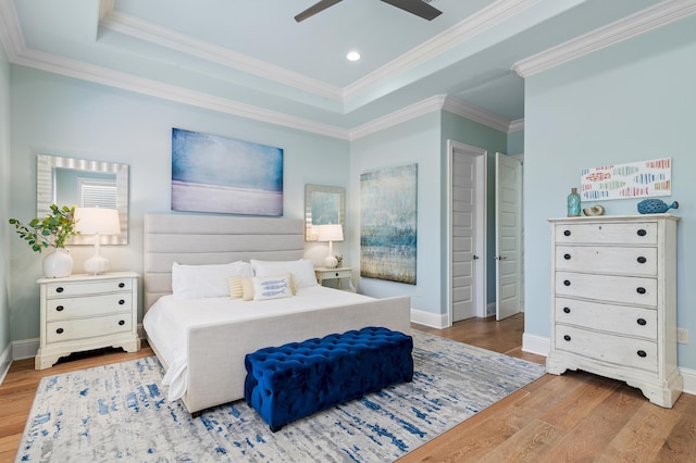 92 Maple St, Santa Rosa Beach, FL 32459 - bedroom featuring wood finished floors, crown molding, a tray ceiling, recessed lighting, and ceiling fan