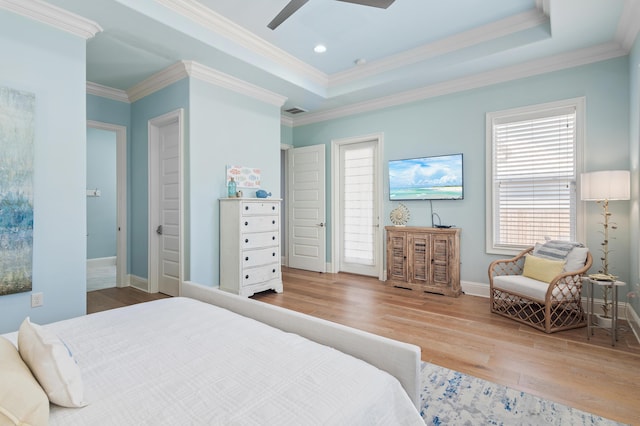 92 Maple St, Santa Rosa Beach, FL 32459 - bedroom with wood finished floors, ornamental molding, a raised ceiling, recessed lighting, and a ceiling fan