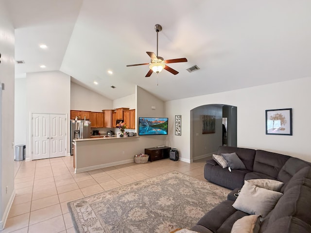 312 Scotch Pine Ln, Crestview, FL 32536 - living room with light tile patterned floors, arched walkways, a ceiling fan, high vaulted ceiling, and recessed lighting