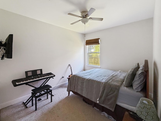 312 Scotch Pine Ln, Crestview, FL 32536 - carpeted bedroom with baseboards and a ceiling fan