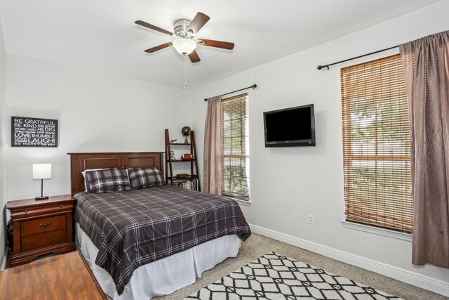 312 Scotch Pine Ln, Crestview, FL 32536 - bedroom featuring baseboards, ceiling fan, and light colored carpet