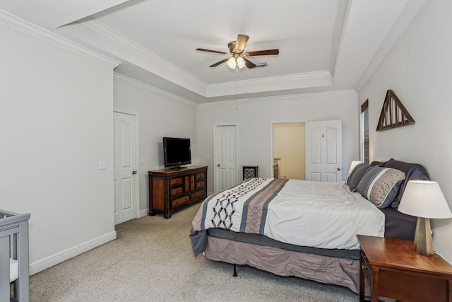 312 Scotch Pine Ln, Crestview, FL 32536 - bedroom featuring a tray ceiling, ornamental molding, light colored carpet, baseboards, and a ceiling fan