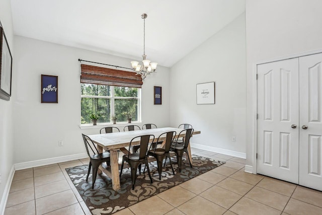 312 Scotch Pine Ln, Crestview, FL 32536 - dining room featuring light tile patterned floors, vaulted ceiling, a chandelier, and baseboards