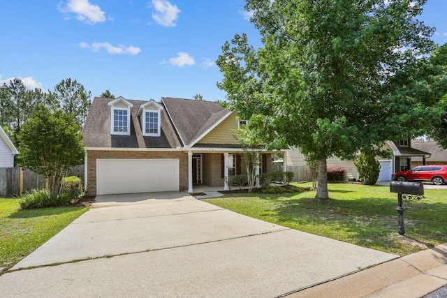 312 Scotch Pine Ln, Crestview, FL 32536 - view of front of home featuring brick siding, covered porch, concrete driveway, an attached garage, and roof with shingles