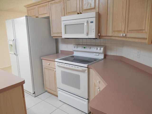 2095 Jessica Way, Navarre, FL 32566 - kitchen featuring white appliances, light brown cabinetry, backsplash, light countertops, and light tile patterned flooring