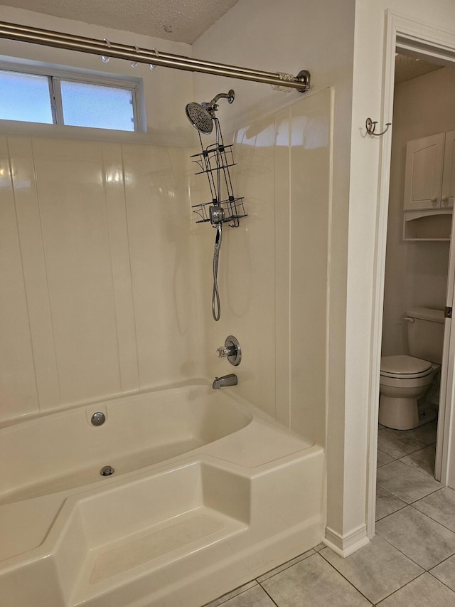 2095 Jessica Way, Navarre, FL 32566 - full bathroom with tile patterned floors, toilet, bathing tub / shower combination, and a textured ceiling