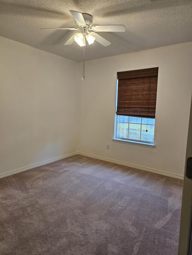 2095 Jessica Way, Navarre, FL 32566 - empty room featuring carpet, ceiling fan, baseboards, and a textured ceiling