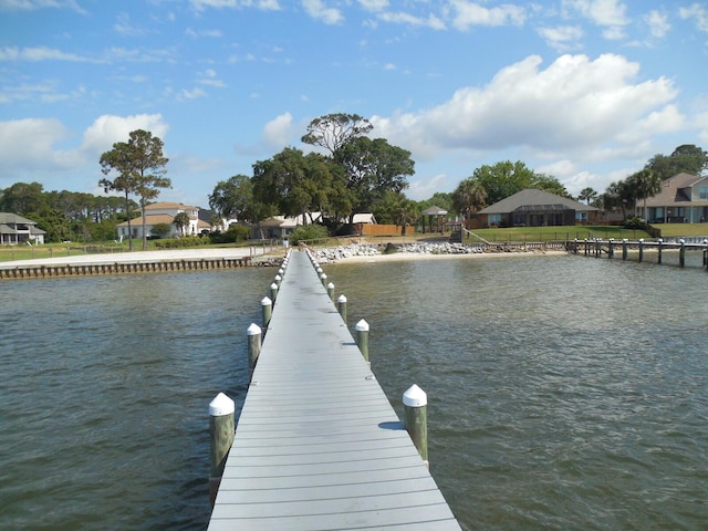 2095 Jessica Way, Navarre, FL 32566 - dock with a water view and a residential view