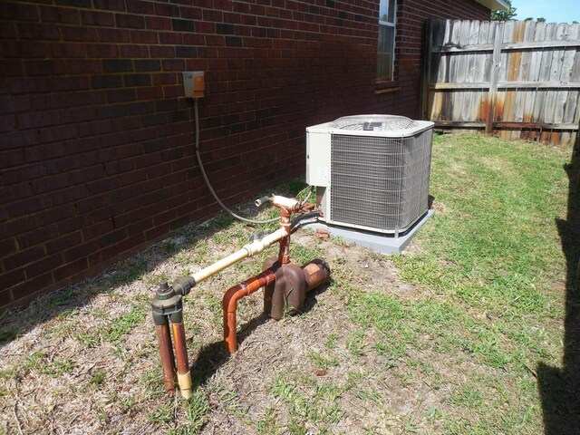 2095 Jessica Way, Navarre, FL 32566 - exterior view of central AC and brick siding