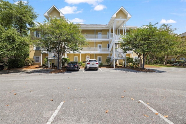 34 Herons Watch Way Unit 1203, Santa Rosa Beach, FL 32459 - view of building exterior featuring uncovered parking