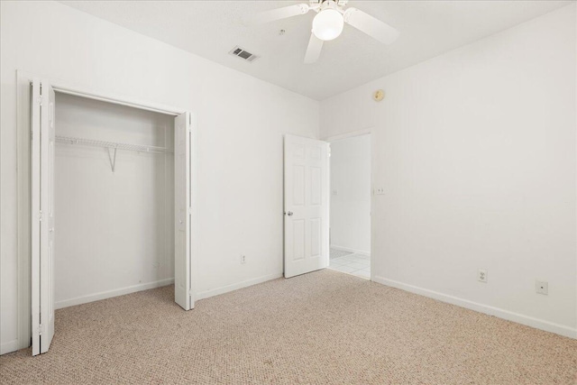 34 Herons Watch Way Unit 1203, Santa Rosa Beach, FL 32459 - unfurnished bedroom featuring light carpet, a closet, and baseboards