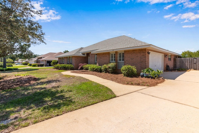 207 E Shipwreck Rd, Santa Rosa Beach, FL 32459 - ranch-style home with brick siding, driveway, an attached garage, and a shingled roof