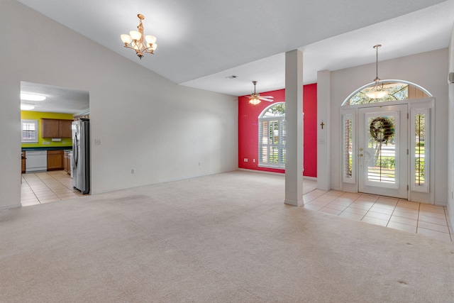 207 E Shipwreck Rd, Santa Rosa Beach, FL 32459 - foyer entrance featuring light carpet, light tile patterned floors, a chandelier, and ceiling fan