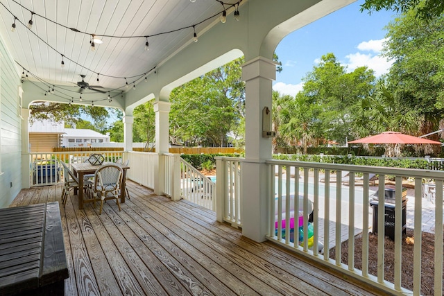515 Seacrest Dr, Inlet Beach, FL 32461 - deck featuring a ceiling fan and outdoor dining space