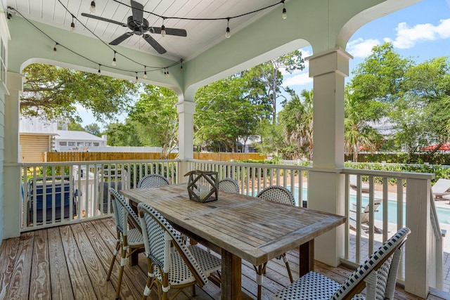 515 Seacrest Dr, Inlet Beach, FL 32461 - deck with ceiling fan, a fenced backyard, and outdoor dining space