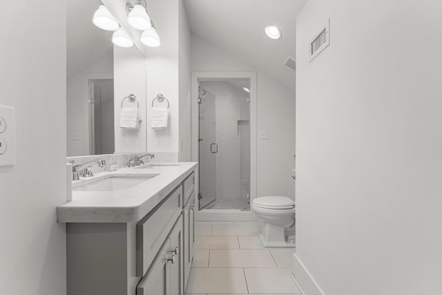 515 Seacrest Dr, Inlet Beach, FL 32461 - bathroom featuring double vanity, a stall shower, toilet, tile patterned flooring, and vaulted ceiling