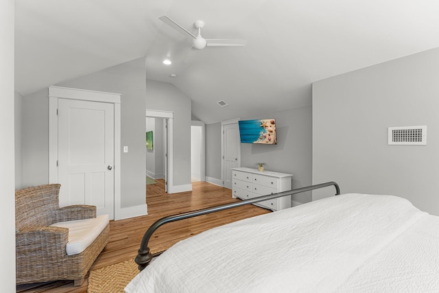 515 Seacrest Dr, Inlet Beach, FL 32461 - bedroom with wood finished floors, vaulted ceiling, a ceiling fan, baseboards, and a closet