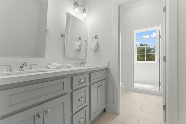 515 Seacrest Dr, Inlet Beach, FL 32461 - full bathroom featuring toilet, double vanity, and tile patterned flooring
