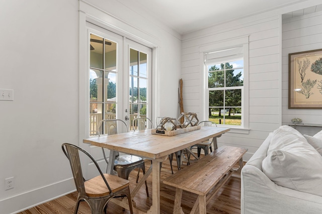 515 Seacrest Dr, Inlet Beach, FL 32461 - dining space featuring wood finished floors, baseboards, and wooden walls
