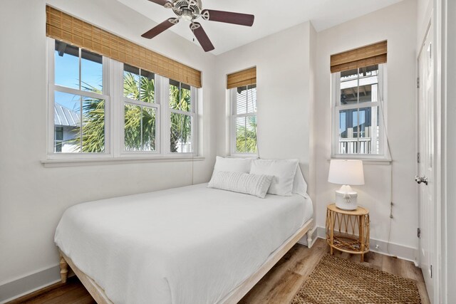 106 N Winston Ln, Inlet Beach, FL 32461 - bedroom with wood finished floors and a ceiling fan
