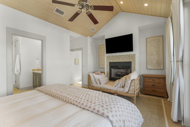 106 N Winston Ln, Inlet Beach, FL 32461 - bedroom with wood ceiling, a fireplace, vaulted ceiling, recessed lighting, and light wood-type flooring
