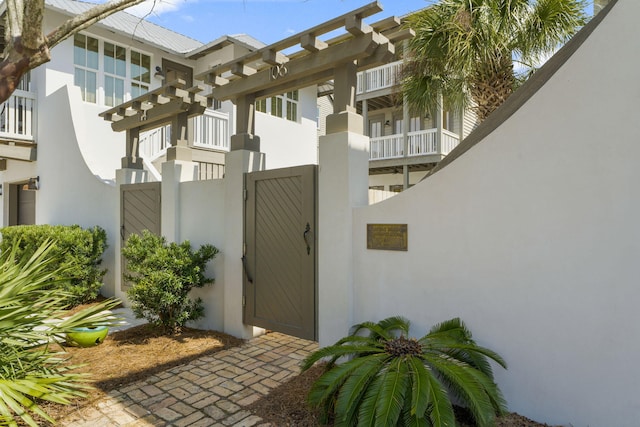 106 N Winston Ln, Inlet Beach, FL 32461 - view of exterior entry with stucco siding