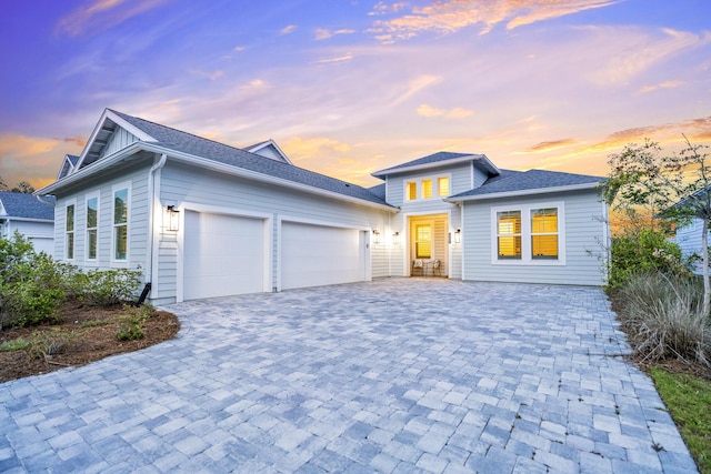 425 W Lafayette, Inlet Beach, FL 32461 - view of front of property featuring an attached garage and decorative driveway