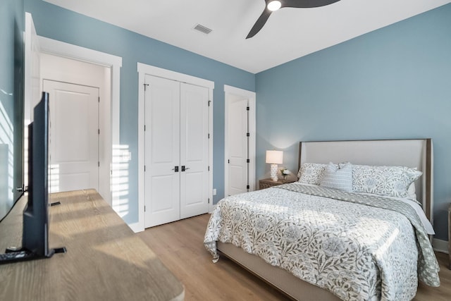 425 W Lafayette, Inlet Beach, FL 32461 - bedroom with wood finished floors, a closet, and ceiling fan