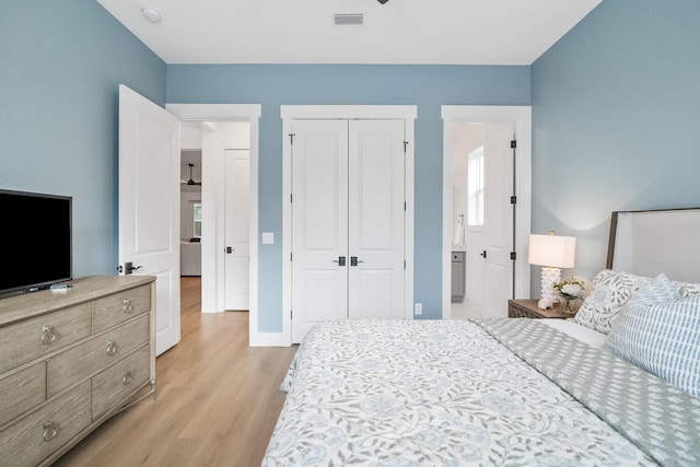 425 W Lafayette, Inlet Beach, FL 32461 - bedroom with light wood-style flooring, a closet, and baseboards