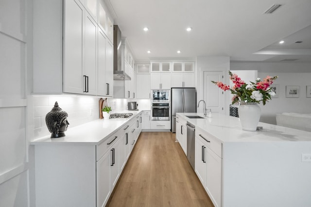 425 W Lafayette, Inlet Beach, FL 32461 - kitchen featuring wall chimney range hood, stainless steel appliances, recessed lighting, backsplash, and a spacious island
