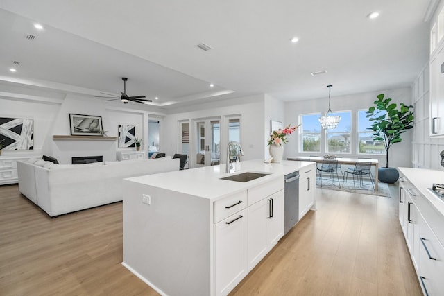 425 W Lafayette, Inlet Beach, FL 32461 - kitchen featuring a sink, light wood-style floors, light countertops, white cabinets, and recessed lighting