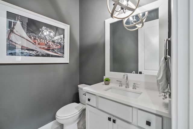 425 W Lafayette, Inlet Beach, FL 32461 - bathroom with a chandelier, vanity, and toilet