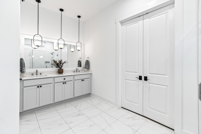 425 W Lafayette, Inlet Beach, FL 32461 - full bath with marble look tiles, double vanity, an enclosed shower, and baseboards
