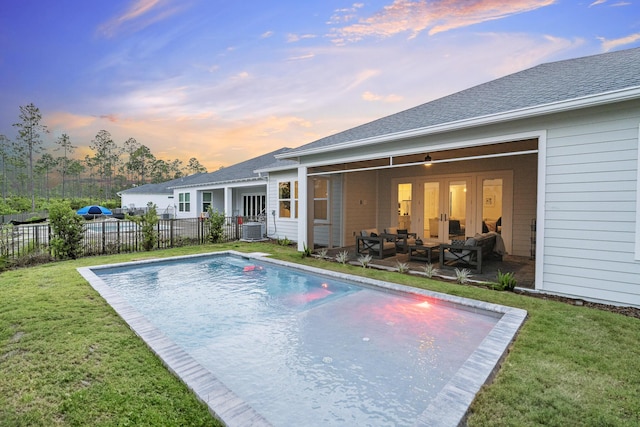 425 W Lafayette, Inlet Beach, FL 32461 - back of property featuring cooling unit, an outdoor hangout area, a patio area, and a shingled roof
