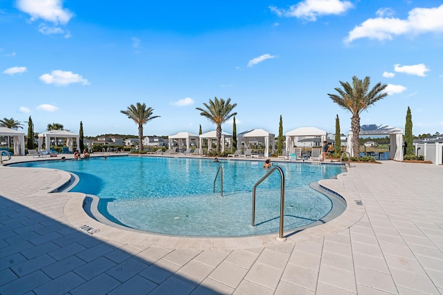 425 W Lafayette, Inlet Beach, FL 32461 - community pool featuring a gazebo, a patio area, and a residential view